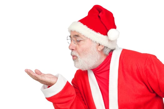 Santa Claus magically blowing in the pal
