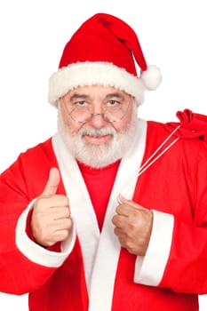 Santa Claus with a full sack saying OK