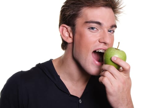 Man eating apple