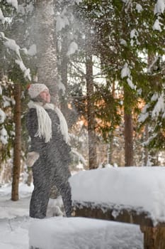 Happy middle-aged woman having fun on wi