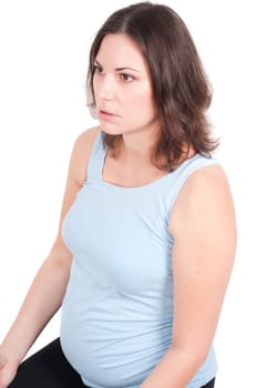 Portrait of pretty pregnant woman baby clothes