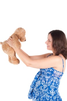 Portrait of pretty pregnant woman baby clothes