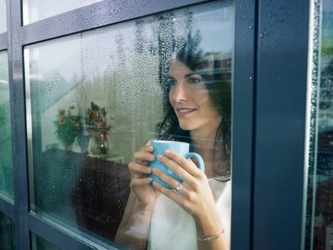 woman having breakfast at home