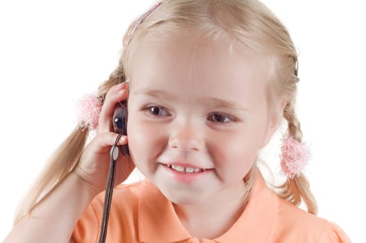 Little girl playing outside