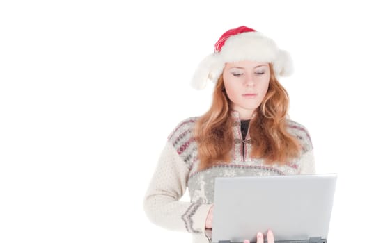 Beutiful woman in cardigan and santa hat