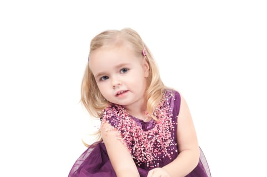Studio shot of baby girl in gala dress