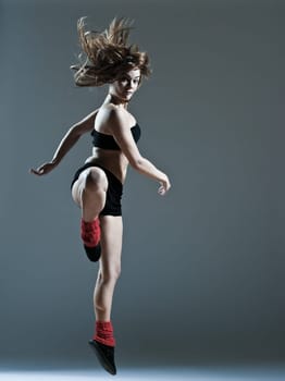 beautiful young woman leap jump