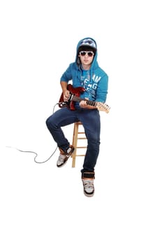 Teen boy with guitar.