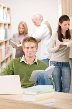 High school library - Student with laptop