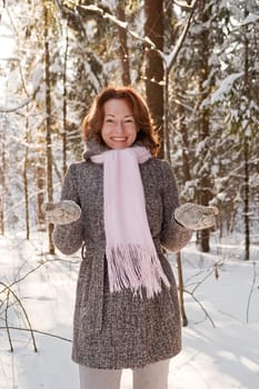 Happy red-haired woman having fun on win