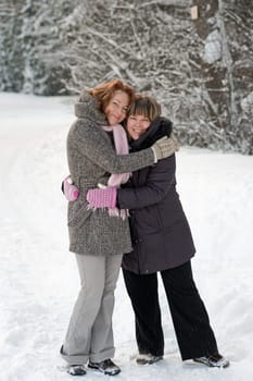 Couple of friends having fun on winters