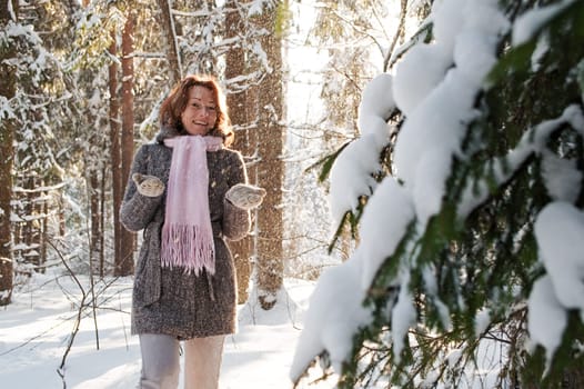 Happy red-haired woman having fun on win