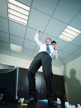 businessman screaming for joy