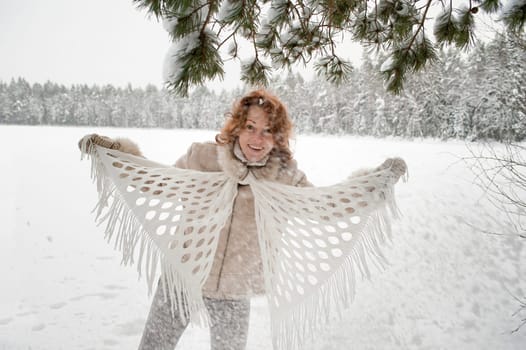 Attractive red-haired woman having fun o