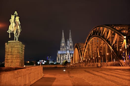 Cologne Cathedral and Hohenzollern Bridge at night