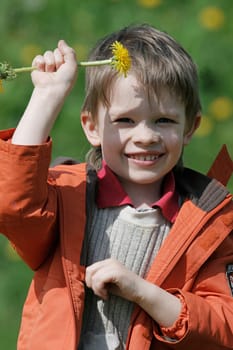 Young boy enjoy summer time in the dande