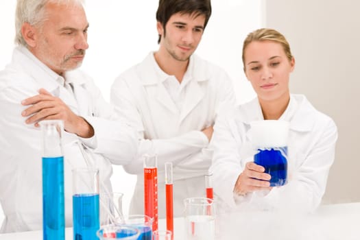 Chemistry experiment - scientists in laboratory