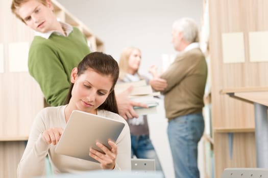 Touch screen tablet computer - students in library