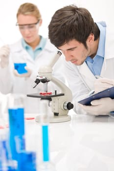 Flu virus experiment - scientist in laboratory