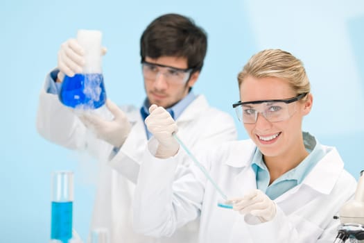 Flu virus experiment - scientist in laboratory
