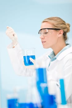 Flu virus experiment - scientist in laboratory