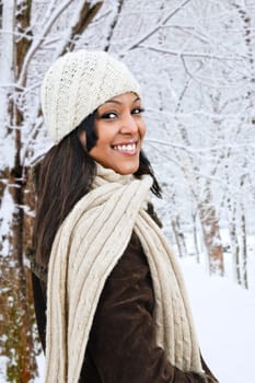 Happy woman outside in winter