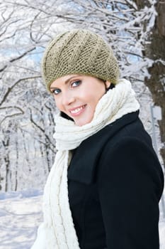 Happy woman outside in winter
