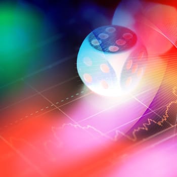 Stock chart with  gambling dice on the color background