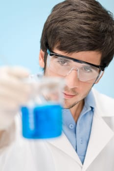 Chemistry experiment - scientist in laboratory