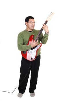 Man standing with guitar.