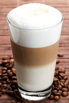 Latte macchiato with coffee beans