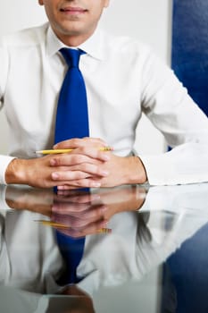 businessman with hands clasped