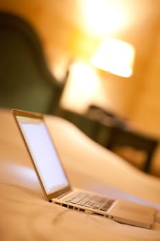 LAPTOP ON BED
