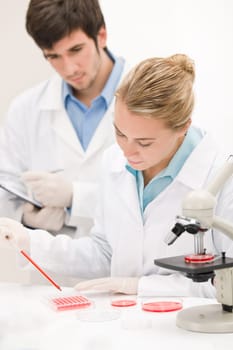 Flu virus experiment - scientist in laboratory
