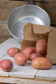 Sieve and potatoes