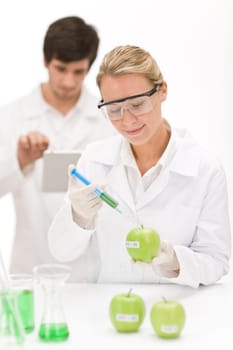 Genetic engineering - scientists in laboratory