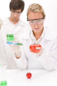 Genetic engineering - scientists in laboratory