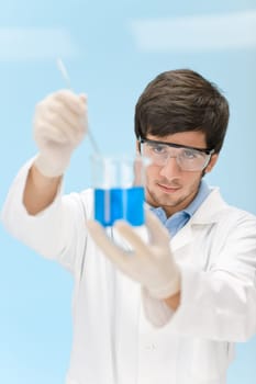 Chemistry experiment - scientist in laboratory