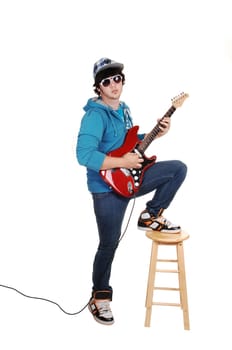 Teen boy with guitar.