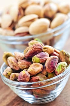 Pistachio nuts in glass bowls