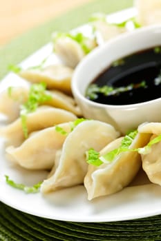 Steamed dumplings and soy sauce
