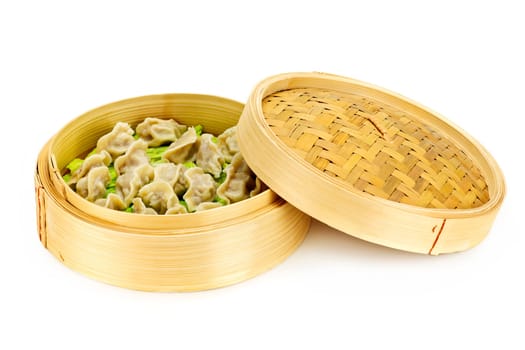 Bamboo steamer with dumplings