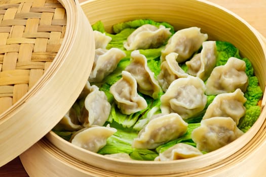 Bamboo steamer with dumplings