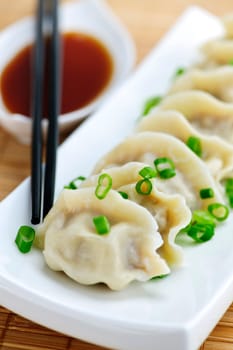 Steamed dumplings and soy sauce