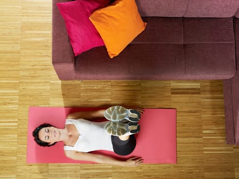 woman doing abs exercise at home