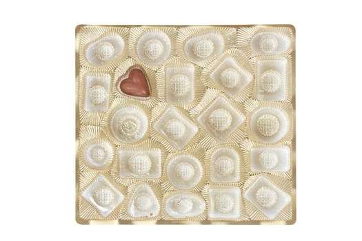 Chocolate candie in a gold box isolated