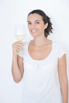 Woman tasting white wine