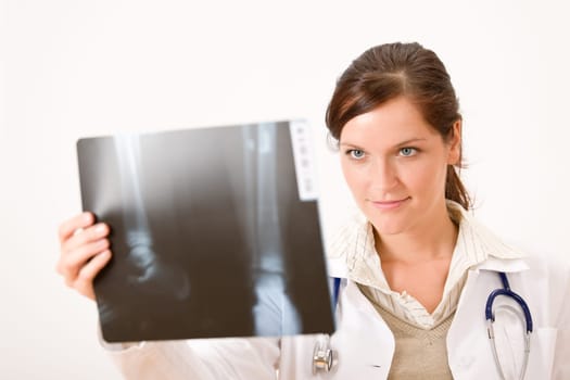 Female doctor holding x-ray