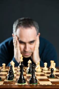 Man at chess board