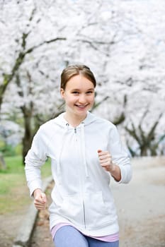Girl jogging in park
